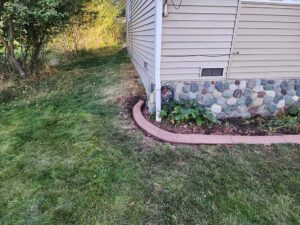 Colored and stamped curbing for flower beds