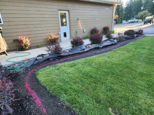 Prep of curbing to separate shrub bedding and lawn