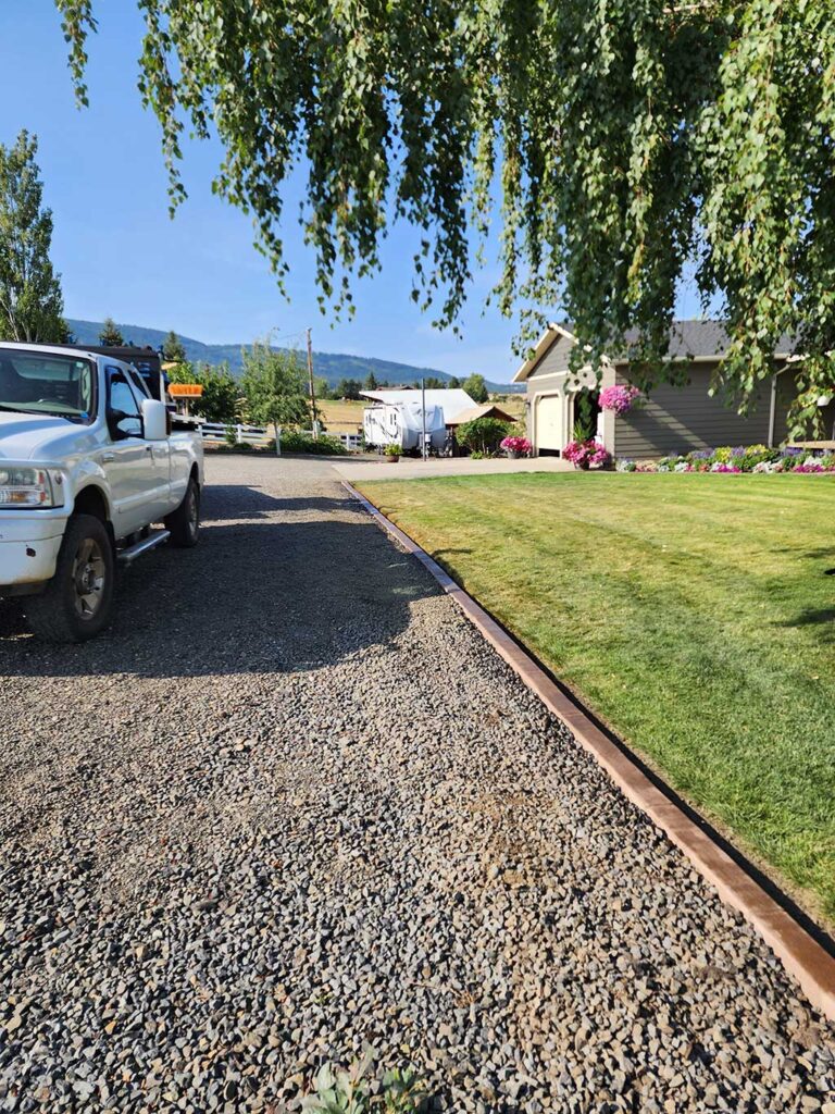Curbing to separate rock and lawn